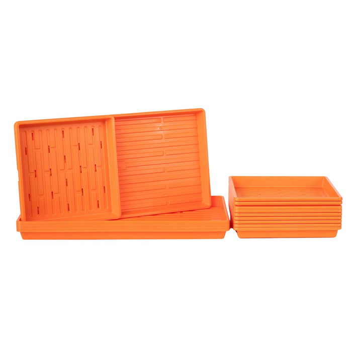 Orange plastic microgreen trays, including perforated and solid bottom options for seed starting and plant growth.