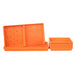 Orange plastic microgreen trays, including perforated and solid bottom options for seed starting and plant growth.