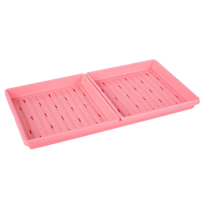 Pink plastic germination trays with drainage for seeds, sprouts, and microgreens.