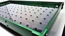 Green anodized aluminum tray with clear plastic base, featuring a grid of dark circular inserts. Ideal for organizing small parts.