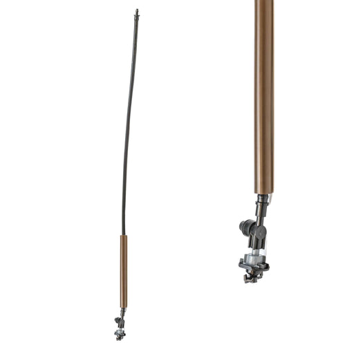 Flexible black irrigation tube with bronze weighted riser and adjustable sprinkler nozzle for drip systems.