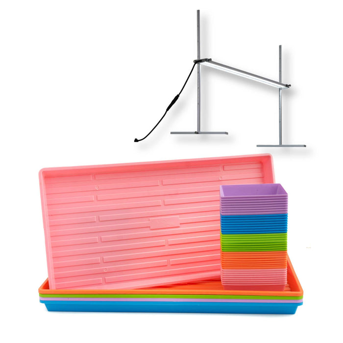 Grow light with colorful plant trays and seedling pots for indoor gardening and seed starting.