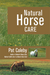 "Natural Horse Care" book by Pat Coleby. Brown horse grazing, white mare and foal in lush green fields.