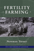 Fertility Farming book cover by Newman Turner. Black and white photo of a farmer driving a vintage tractor, pulling hay.