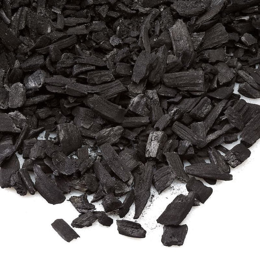 Natural lump charcoal for grilling, BBQ, and smoking. Dark wood pieces, ideal cooking fuel.