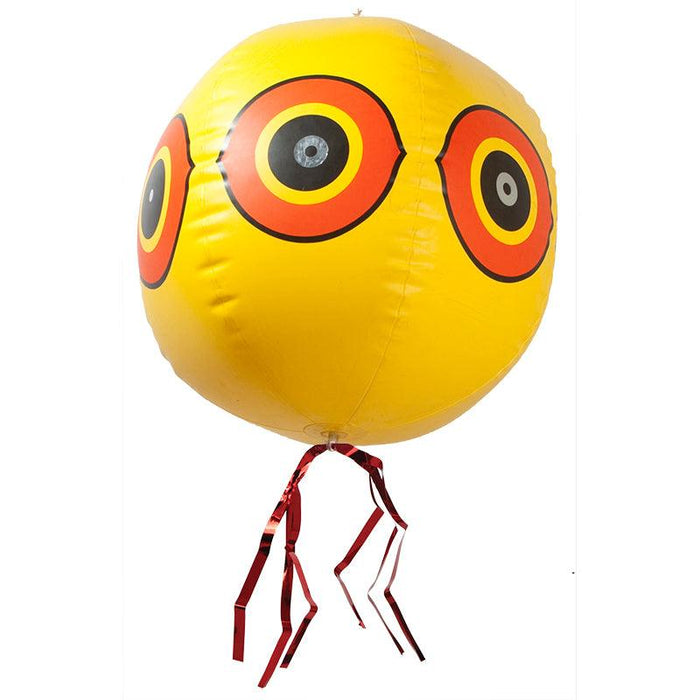 Yellow inflatable owl eye bird deterrent balloon with reflective red streamers.