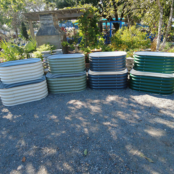 Colorful corrugated metal raised garden beds in beige, olive, dark blue, dark green. Durable planters for backyard gardening.