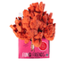 Fungi Friends pink oyster mushroom grow kit producing many vibrant coral-orange mushrooms. Fresh, home-grown gourmet fungi.
