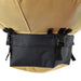 Tan and black durable backpack pocket with quick-release buckles and sturdy webbing straps.