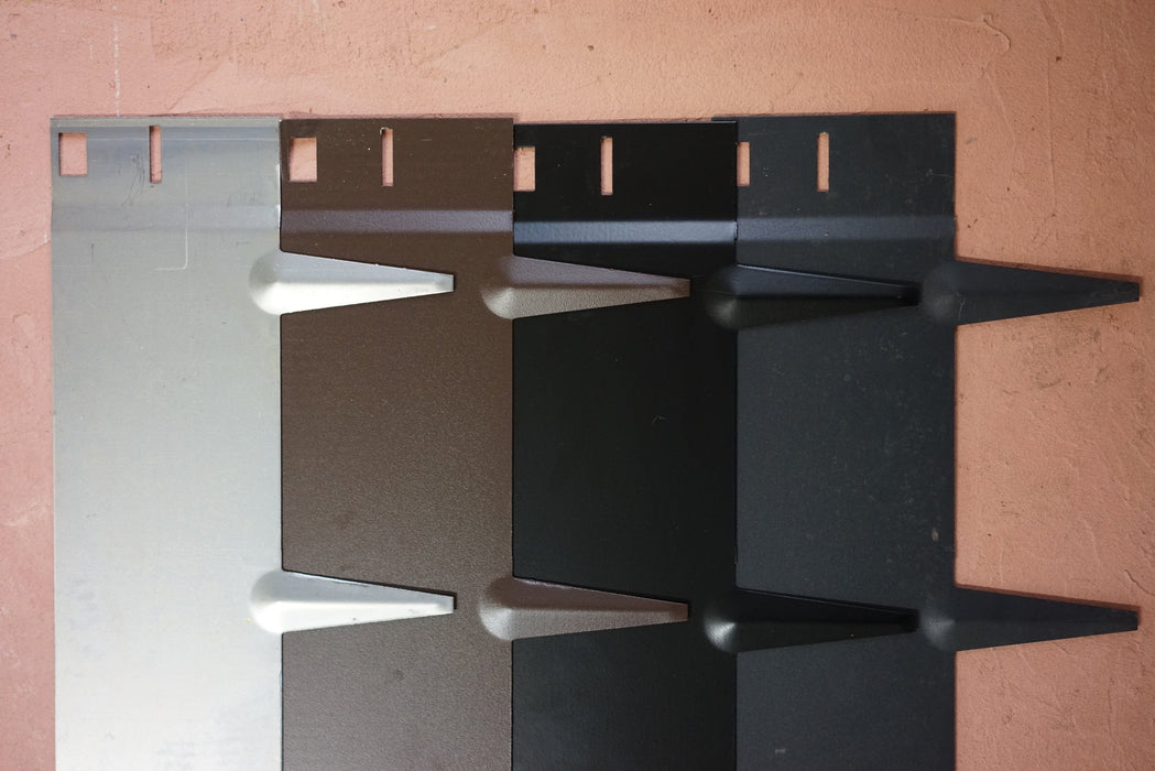 Durable metal landscape edging in silver, brown, and black. Interlocking panels with ground stakes for garden beds and lawn borders.