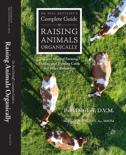 Dr. Paul Dettloff's Complete Guide to Raising Animals Organically book cover with cows on grass. Organic farming, cattle, ruminant care.
