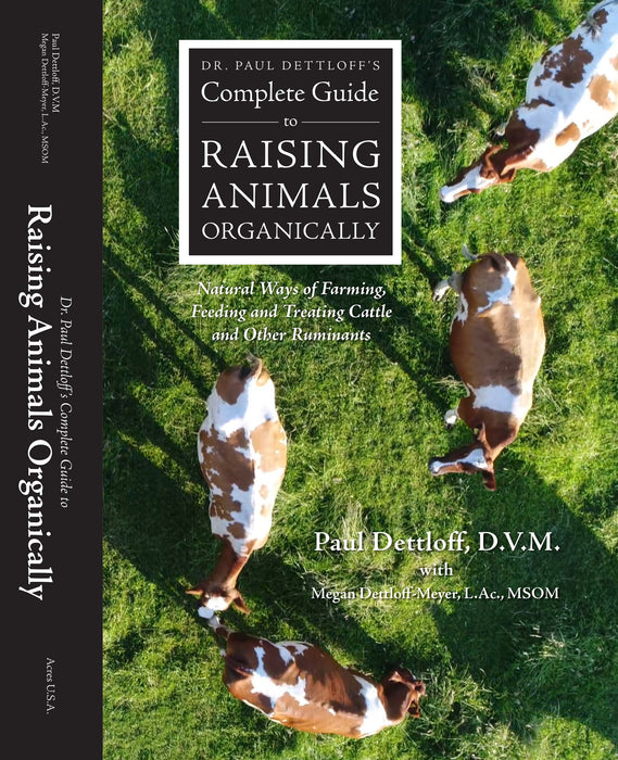 Dr. Paul Dettloff's Complete Guide to Raising Animals Organically book cover with cows on grass. Organic farming, cattle, ruminant care.