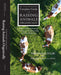 Dr. Paul Dettloff's Complete Guide to Raising Animals Organically book cover with cows on grass. Organic farming, cattle, ruminant care.