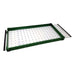 Green-framed rectangular LED light panel with clear studded surface and a translucent slide-out tray.