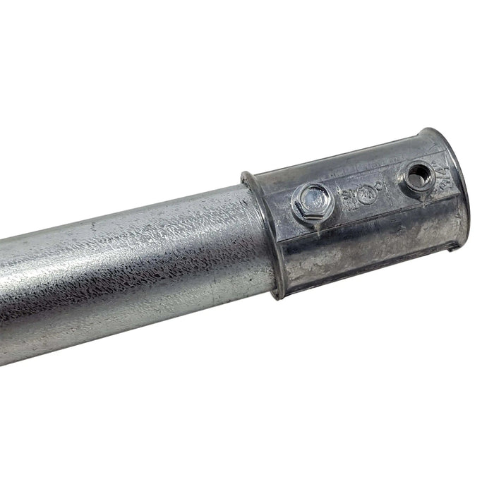 Galvanized 3/4" electrical conduit pipe connected to a UL-listed set-screw coupler. Metal EMT/rigid fitting.