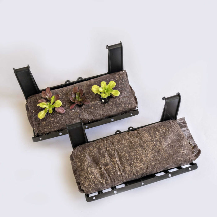 Two vertical garden grow kits: one with vibrant lettuce seedlings, another with a coco coir grow bag, ready for planting.