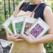 Four seasonal garden planners: Cool, Cold, Warm, Hot. Covers show kale, peppers, eggplant. Perfect for garden planning.