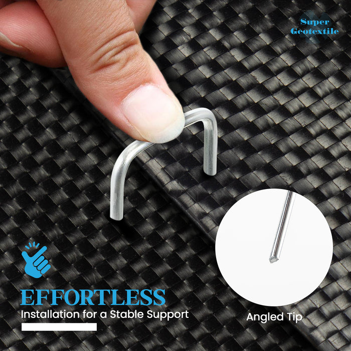 U-shaped landscape fabric pins pressed into black geotextile weed barrier. Angled tip ensures effortless, stable support.