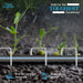 All-weather rust-resistant garden stakes secure a drip irrigation line in rainy soil with young plants.