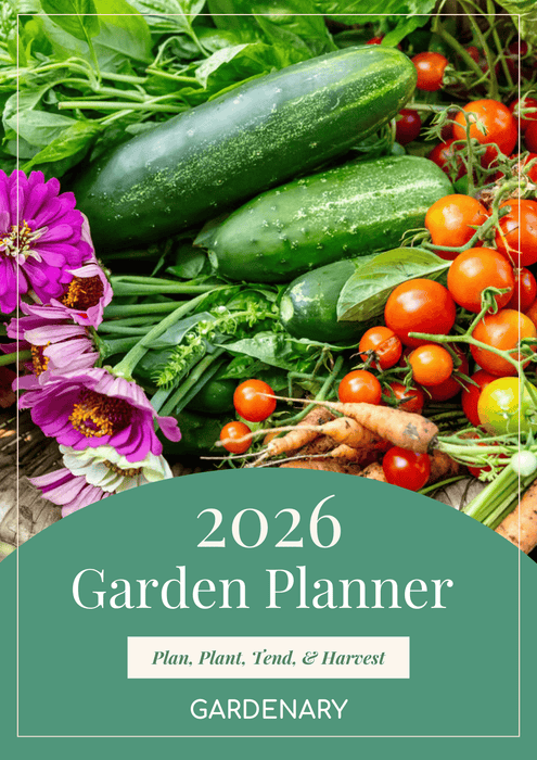 Fresh garden harvest with cucumbers, tomatoes, carrots, basil, and zinnias. 2026 Garden Planner.