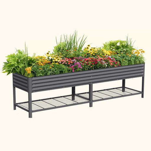 Dark grey corrugated galvanized steel raised garden bed planter with colorful flowers and lower storage shelf.