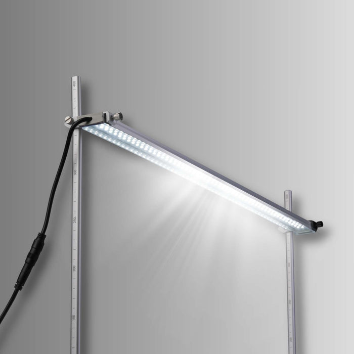 Bright linear LED light bar mounted diagonally on an adjustable stand with height measurements. Ideal for plant growth or aquariums.