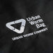 White embroidered "Urban Worm Bag" and "Urban Worm Company" logo with a worm icon on black fabric, ideal for vermicomposting.