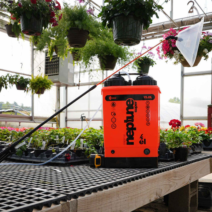 Neptune Super greenhouse sprayer with clear shield, caring for hanging baskets and potted plants. Horticulture equipment.