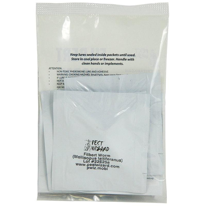 Pest Wizard Filbert Worm pheromone lure packet for Mellisopus lattiferanus pest control, with usage instructions.