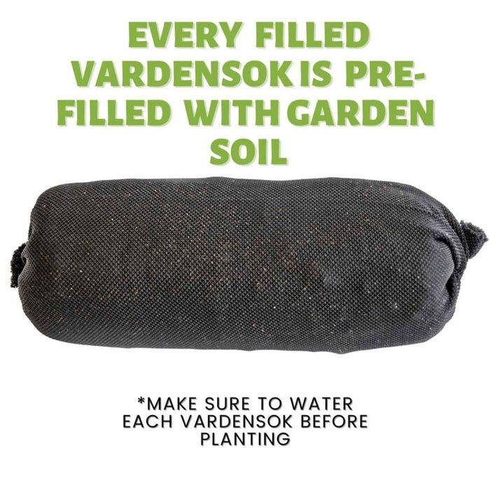 Dark fabric Vardensok grow bag pre-filled with garden soil, ready for easy planting.
