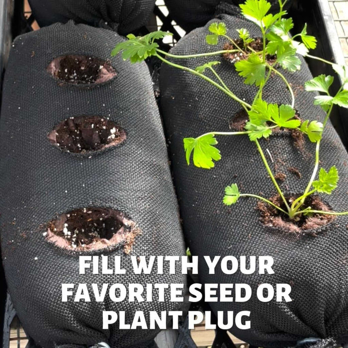 Black fabric grow bags for vertical gardening. One has young parsley plants, the other is ready for seeds or plant plugs.