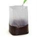 Watering potting mix in translucent plastic nursery bag for seedlings & plant propagation.