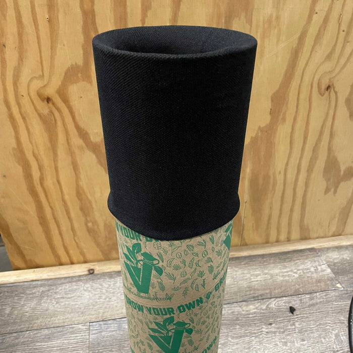Black fabric grow bag on a "Grow Your Own" vertical garden tube. Use for plants, gardening, seed starting, urban farming.