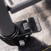 Black caster wheel brake lever showing "OFF" position. Durable locking mechanism for heavy-duty furniture or equipment mobility.