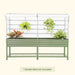 Veggie Garden white mesh greenhouse cover on olive raised garden bed with plants & lower storage shelf. Plant protector.