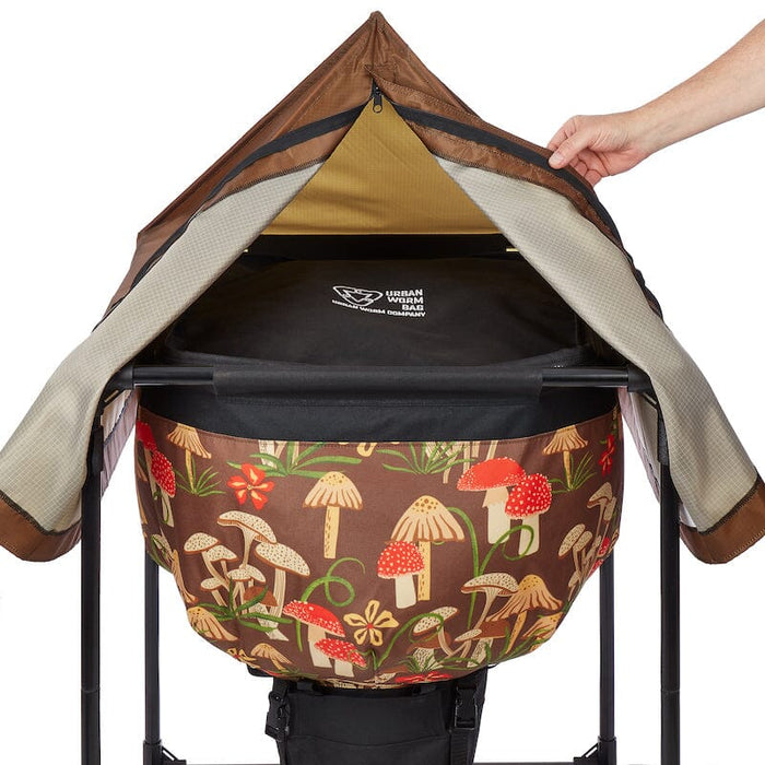 Urban Worm Bag vermicompost bin, brown fabric with red & tan mushroom pattern. Top zippered opening for home composting.