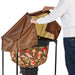 Hands opening a brown lid on a garden cart with a mushroom-patterned bag. Ideal for yard waste, leaves, composting.