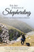 "The Art & Science of Shepherding" book cover. French shepherd, dog, and sheep flock on a misty mountain.