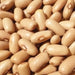 Close-up of dried light brown beans. Healthy legumes for cooking, rich in protein and fiber.