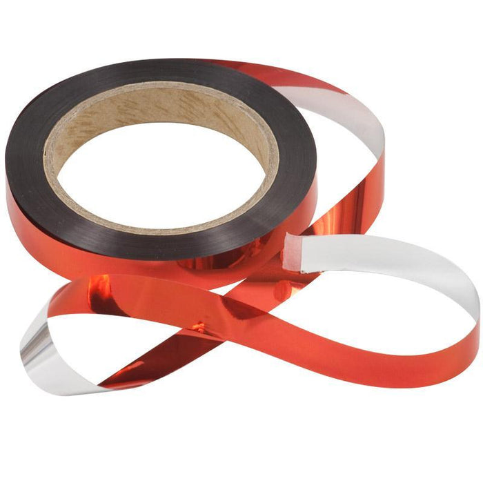 Red metallic ribbon on a spool with a shiny, reflective surface. Ideal for gift wrapping, crafts, and party decor.