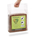 Hand holding Urban Worm Coco Coir brick, natural coconut fiber for soil amendment & worm bedding.