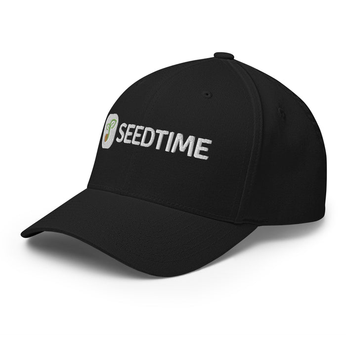 Black Seedtime embroidered baseball cap featuring white text and a green sprout logo. Stylish gardening apparel.