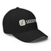 Black baseball cap with embroidered Seedtime logo featuring a green sprout and seed.