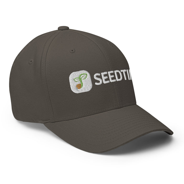 Dark grey Seedtime embroidered baseball cap featuring a sprouting seed logo.