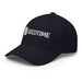Navy blue baseball cap with white embroidered Seedtime logo and sprout graphic.