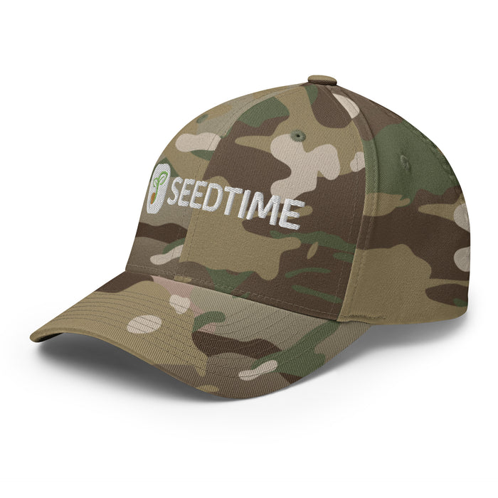 Camo baseball cap with embroidered white SEEDTIME logo & green sprout icon. Perfect for gardening & outdoors.