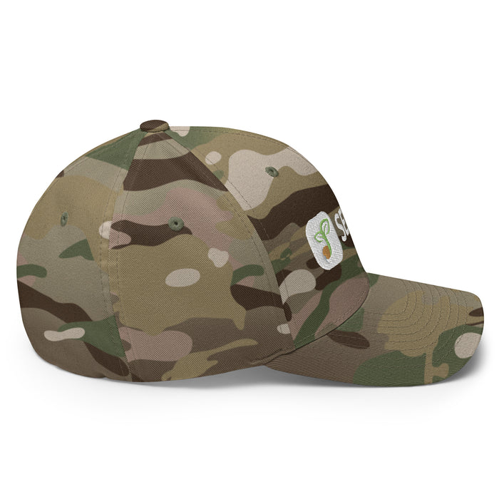 Multi-cam camouflage baseball cap with embroidered white patch featuring a green sprout logo. Tactical outdoor hat.