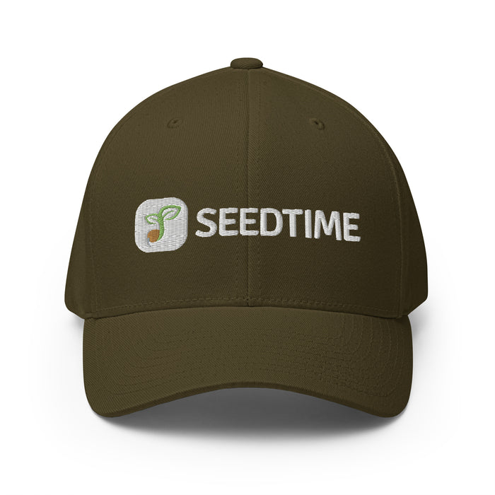 Olive green Seedtime baseball cap with plant sprout logo, perfect for gardening.
