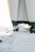 Self-watering planter's clear drainage tube releases excess water. Mobile garden overflow system.