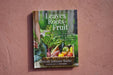 "Leaves, Roots & Fruit" organic gardening book. Cover shows person harvesting fresh vegetables: kale, carrots, tomatoes.